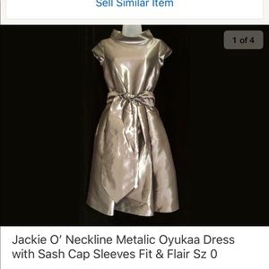 Oyukka roll neck Jackie O’ style dress with sash